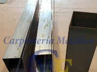 pliegues1  Contrapesas Puerta Basculante